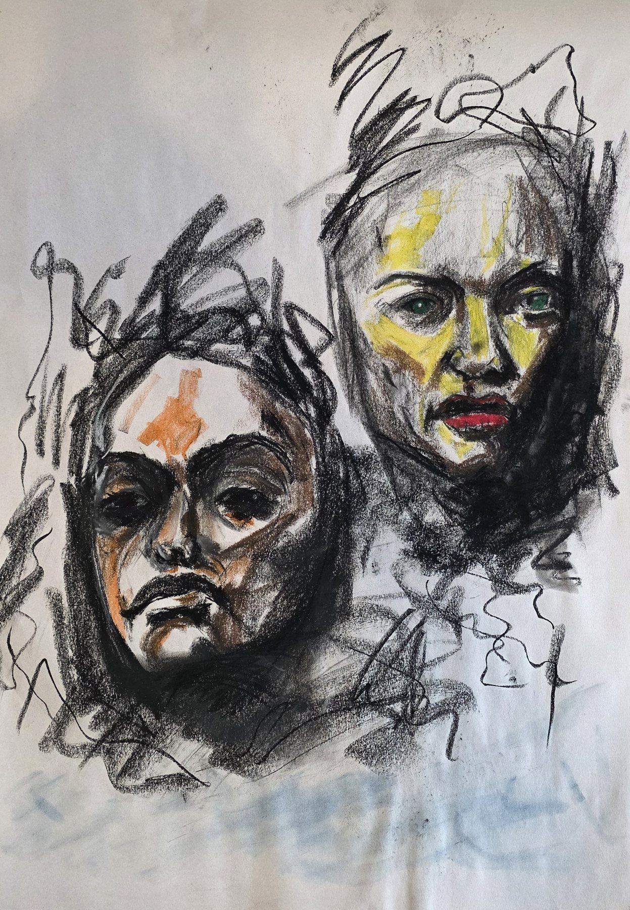 Two expressive charcoal faces with orange and yellow pastel accents