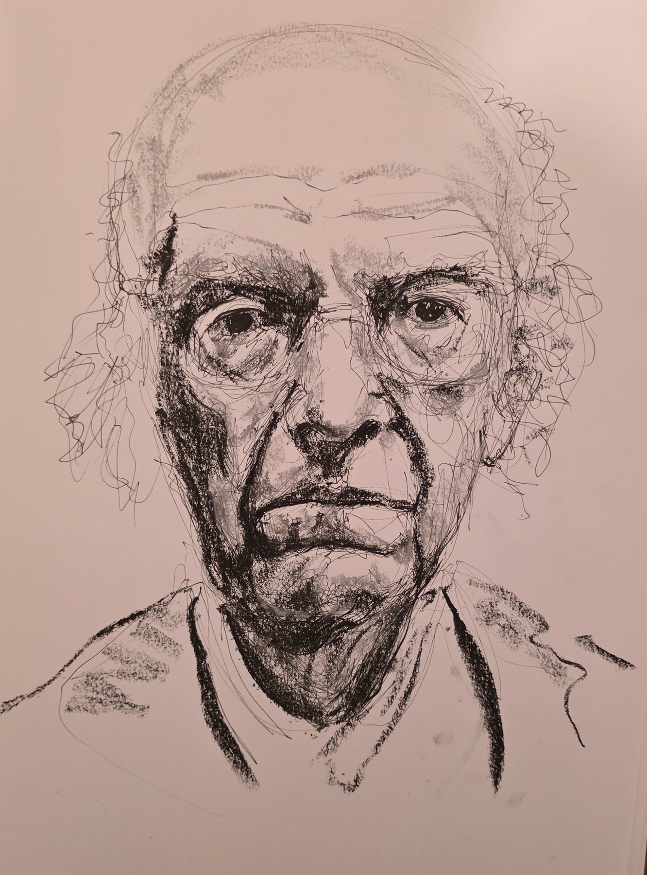 Pen and charcoal portrait of an old man in glasses, looking straight ahead