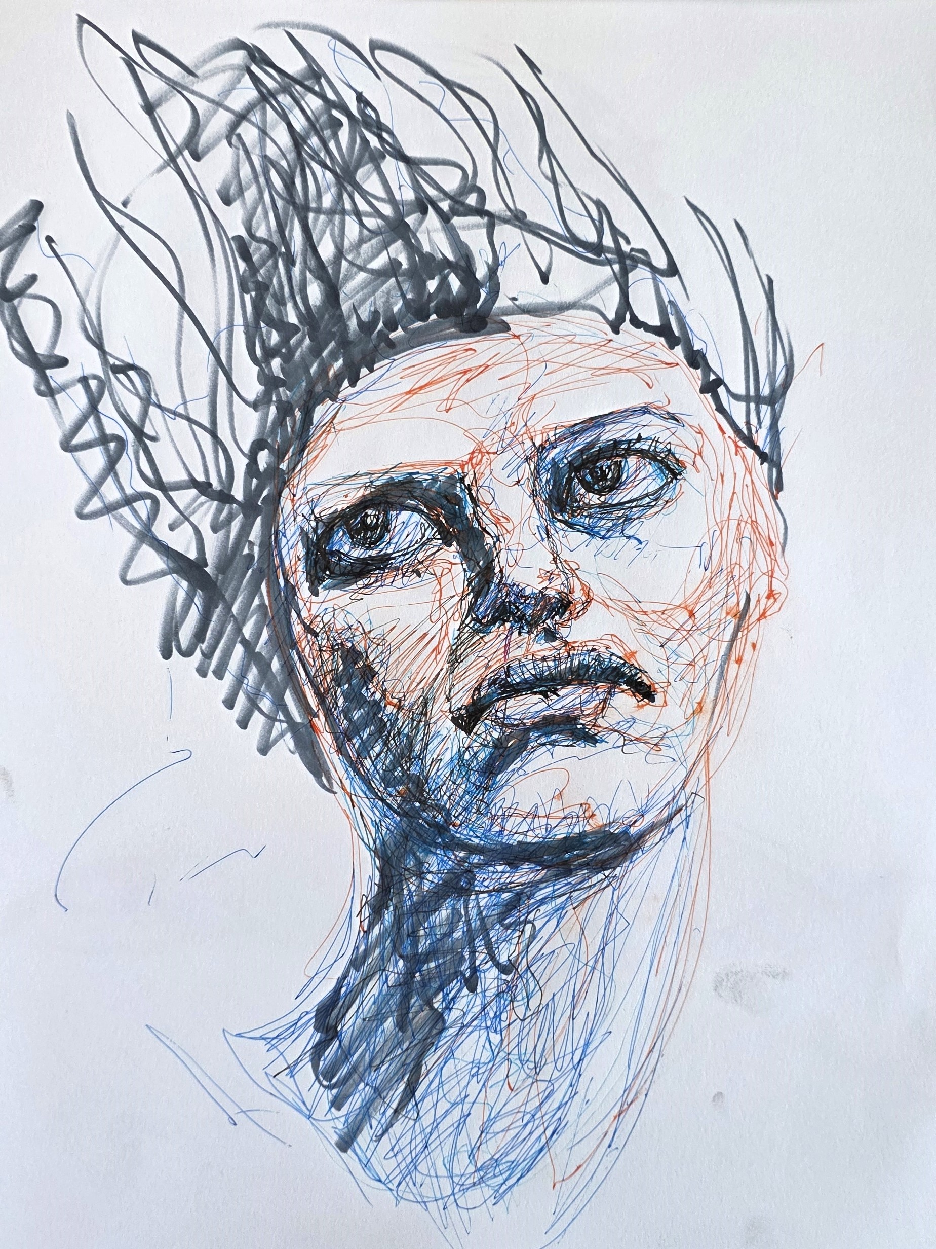 Upward-looking face in blue and orange pen with energetic black strokes of hair